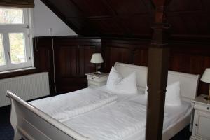 Postelja oz. postelje v sobi nastanitve Fürstenhof Wernigerode Garni