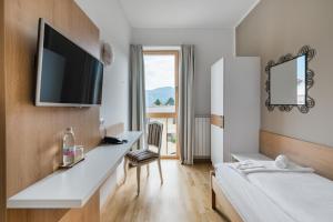 Hotel Dvorec客房内的一张或多张床位