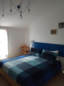 A bed or beds in a room at I Cavalieri di Malta