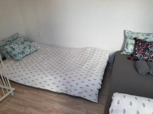 Postel nebo postele na pokoji v ubytování Inside Busan Hostel