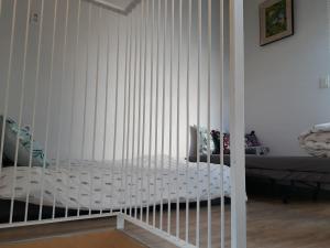 Postel nebo postele na pokoji v ubytování Inside Busan Hostel