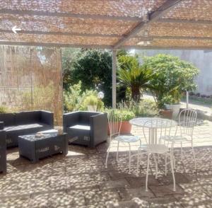 A seating area at BB La casa di Tella