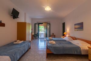 Posteľ alebo postele v izbe v ubytovaní Rivendell Apartments