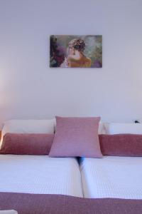 Posteľ alebo postele v izbe v ubytovaní Rivendell Apartments