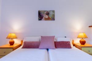 Posteľ alebo postele v izbe v ubytovaní Rivendell Apartments