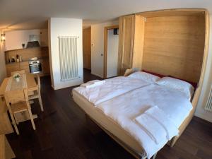 Postel nebo postele na pokoji v ubytování ILIA House