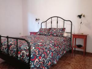 A bed or beds in a room at Casa Vista Bella