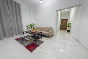 Χώρος καθιστικού στο Al Sqlawi Hotel Apartment