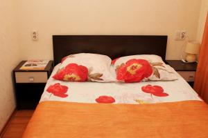 Кровать или кровати в номере Гостиница Люкс