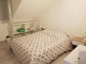 Postel nebo postele na pokoji v ubytování Lourdes Guest House