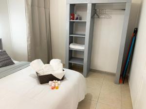 Postel nebo postele na pokoji v ubytování Le MABOUYA