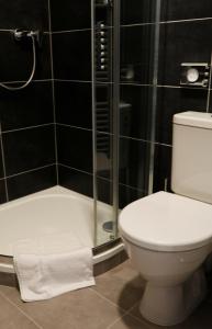 Kúpeľňa v ubytovaní Penzion&Pizzerie U Massima