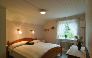 Postel nebo postele na pokoji v ubytování Nice Home In rjng With Wifi