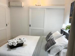 Postel nebo postele na pokoji v ubytování Le MABOUYA