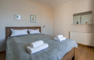 Postel nebo postele na pokoji v ubytování 2-room Apartment NFT Vista Gudauri 17- Near Ski Lift + 29 fotografií