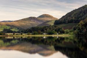 a view of a lake with mountains in the background at Kirkstile Inn in Loweswater