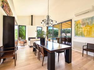 a dining room with a table and chairs at Holiday Home Son Tey by Interhome in Sineu