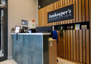 an office with a desk and a sign for anveltiers collection at All Bar One by Innkeeper's Collection in Liverpool