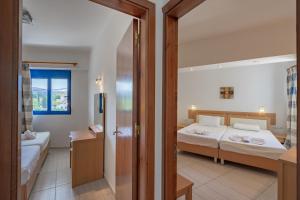 Postel nebo postele na pokoji v ubytování Raffaello Beach
