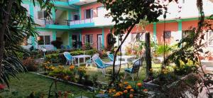 A garden outside New Pokhara Lodge - Pokhara Lakeside