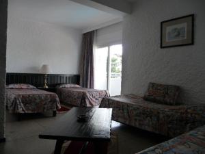 HOTEL KAMAL CITY CENTER客房内的一张或多张床位