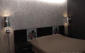 Postel nebo postele na pokoji v ubytování Hotel Cezaria