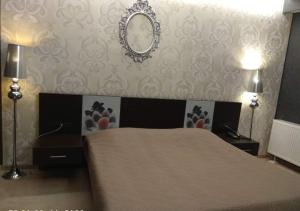 Postel nebo postele na pokoji v ubytování Hotel Cezaria