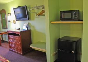 TV a/nebo společenská místnost v ubytování Hawthorne's Best Inn