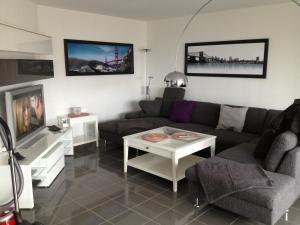 TV a/nebo společenská místnost v ubytování City Marina