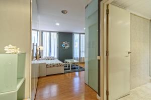 A bed or beds in a room at Loft en Badalona Centro