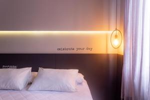 Postel nebo postele na pokoji v ubytování Hotel Melo
