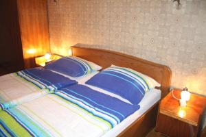 Cama o camas de una habitación en Nostalgie Apartments Titz