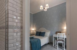 Posteľ alebo postele v izbe v ubytovaní A Casa di Titty