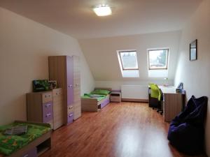 Posedenie v ubytovaní Ubytování v podkroví