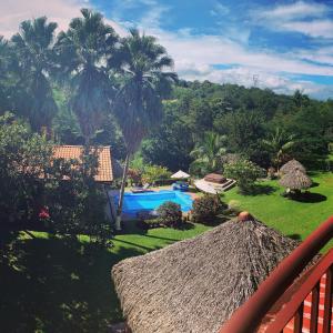 Vista de la piscina de Hotel Poza Blanca Lodge o alrededores