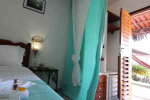 Кровать или кровати в номере Hotel Pousada 360