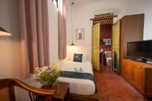 TV a/nebo společenská místnost v ubytování Sweet Cili Boutique Hotel + 37 fotografií