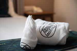 Postel nebo postele na pokoji v ubytování Sweet Cili Boutique Hotel