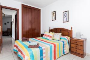 Postel nebo postele na pokoji v ubytování Apartamento el Carmen