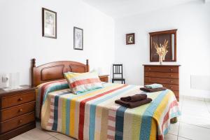 Postel nebo postele na pokoji v ubytování Apartamento el Carmen