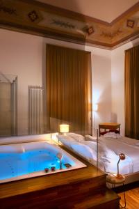 The swimming pool at or close to Naca Suite