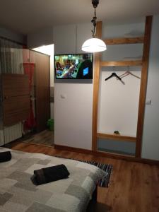 Noclegi Przy Szlaku Agroturystyka客房内的一张或多张床位