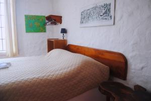Voodi või voodid majutusasutuse Hostal Galapagos by Bar de Beto toas