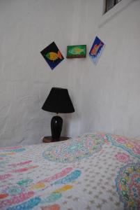 Voodi või voodid majutusasutuse Hostal Galapagos by Bar de Beto toas