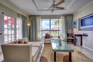 A television and/or entertainment centre at Mystique St Lucia by Royalton