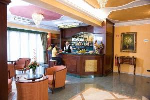 O lounge ou bar de Agostiniana Hotel