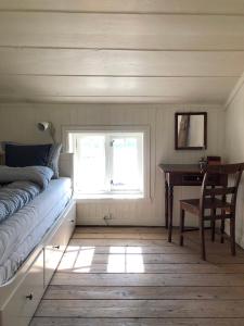 En eller flere senge i et værelse på Pålberget