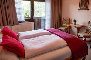 Postel nebo postele na pokoji v ubytování Hotel Pension Residence