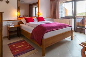 Postel nebo postele na pokoji v ubytování Hotel Pension Residence