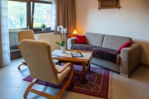 Posezení v ubytování Hotel Pension Residence